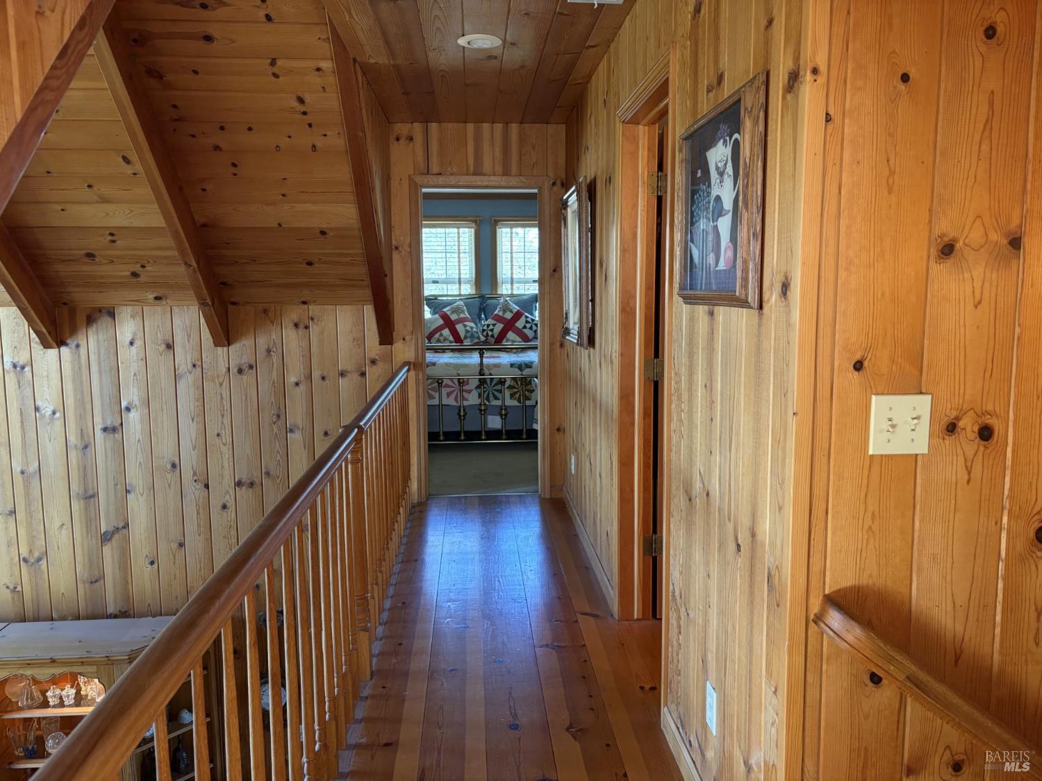 2617 South Old Highway Road Catheys Valley, CA 95306 - Photo 17 of 30 Upstairs hallway with two bedrooms and one full bathroom with tub and shower.