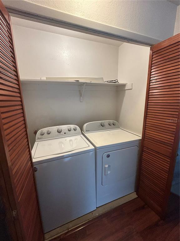 4031 Henley Road, Unit 1706 Orlando, FL 32839 - Photo 23 of 41 a utility room with dryer and washer