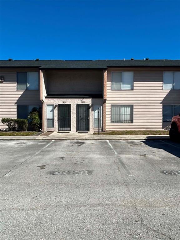4031 Henley Road, Unit 1706 Orlando, FL 32839 - Photo 3 of 41 a view of a car garage