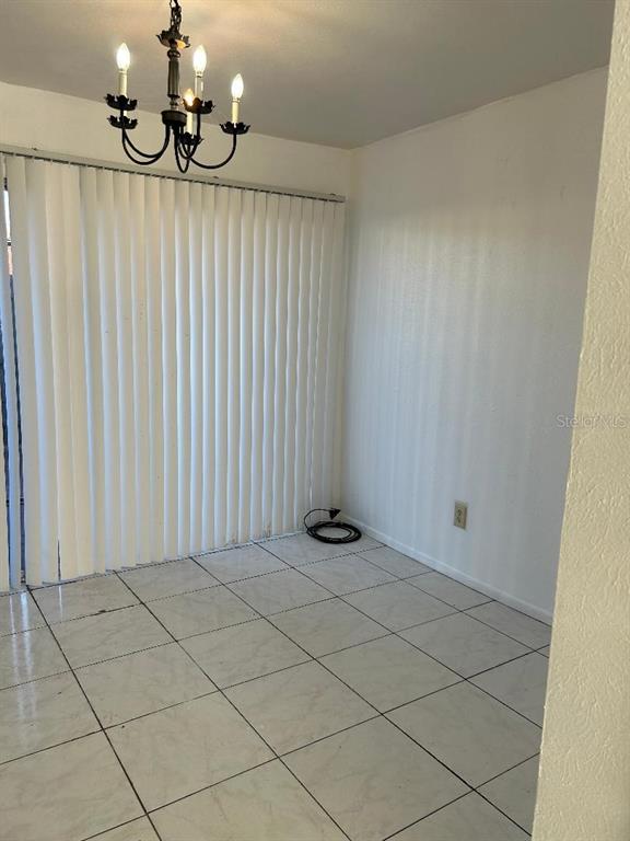 4031 Henley Road, Unit 1706 Orlando, FL 32839 - Photo 9 of 41 a view of an empty room