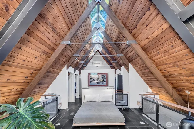 a bathroom with a shower and a sink