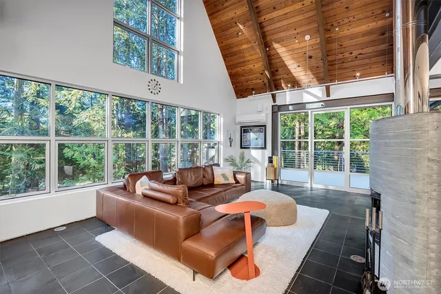 a view of a chairs and table in the patio