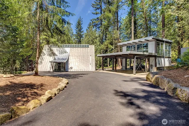 front view of a house with a yard balcony