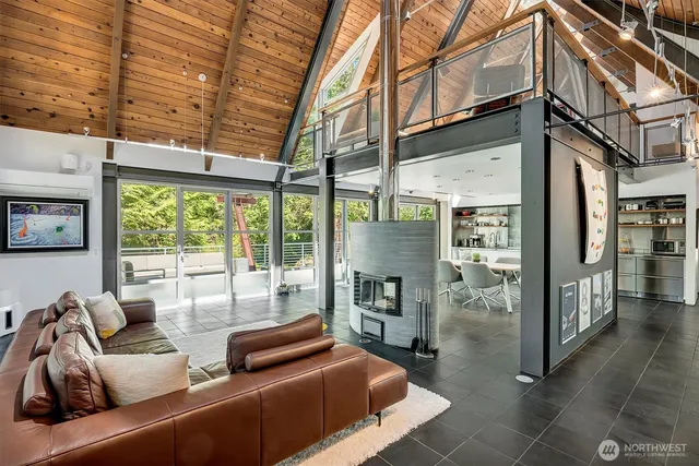 a outdoor living space with patio furniture and a fireplace