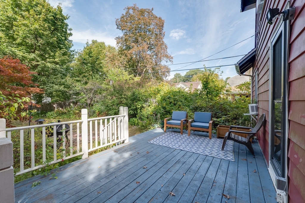 60 Blake Street Springfield, MA 01108 - Photo 24 of 30 a view of a patio with wooden floor and outdoor seating