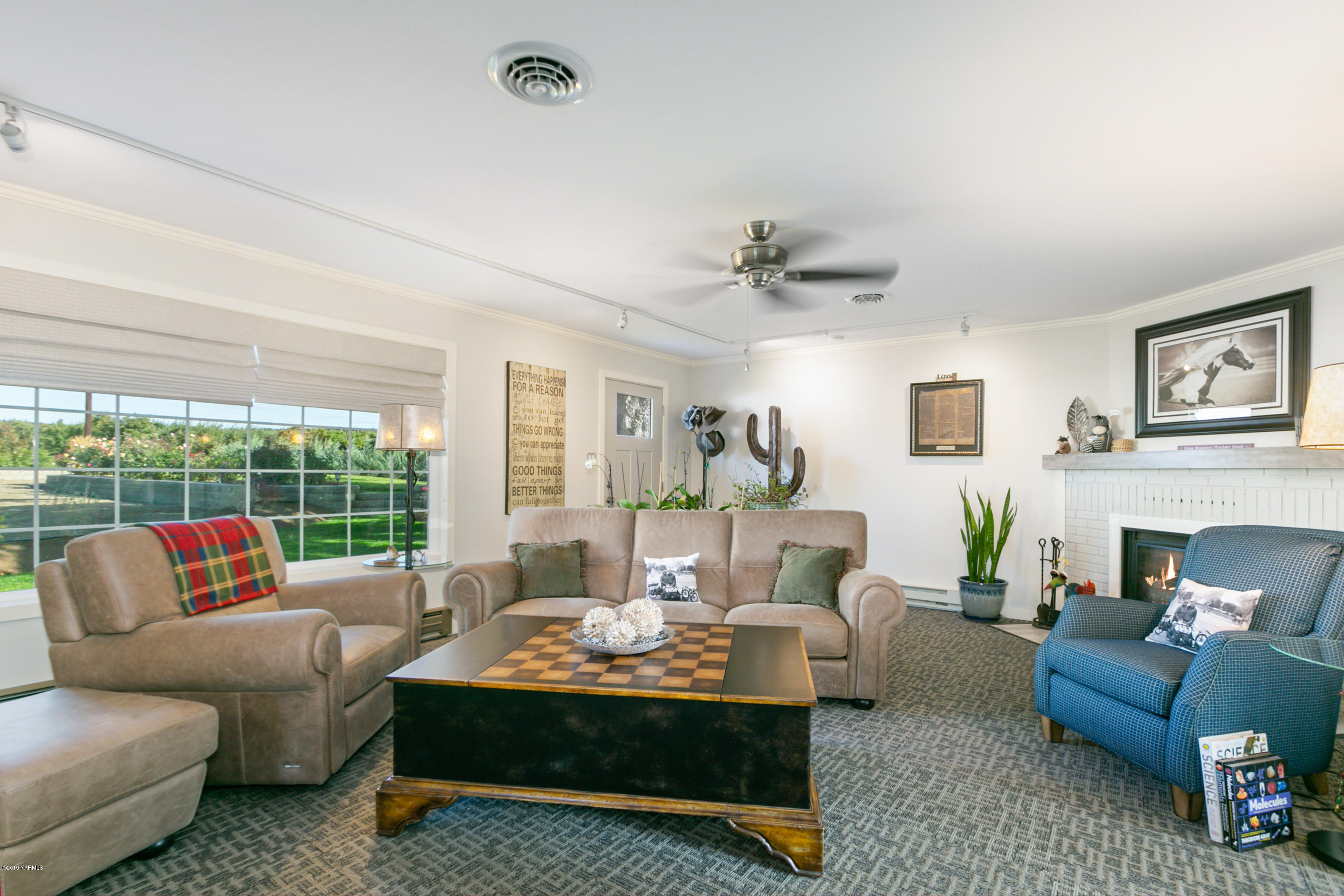 250 Rudd Road Tieton, WA 98947 - Photo 6 of 29 a living room with furniture and a large window