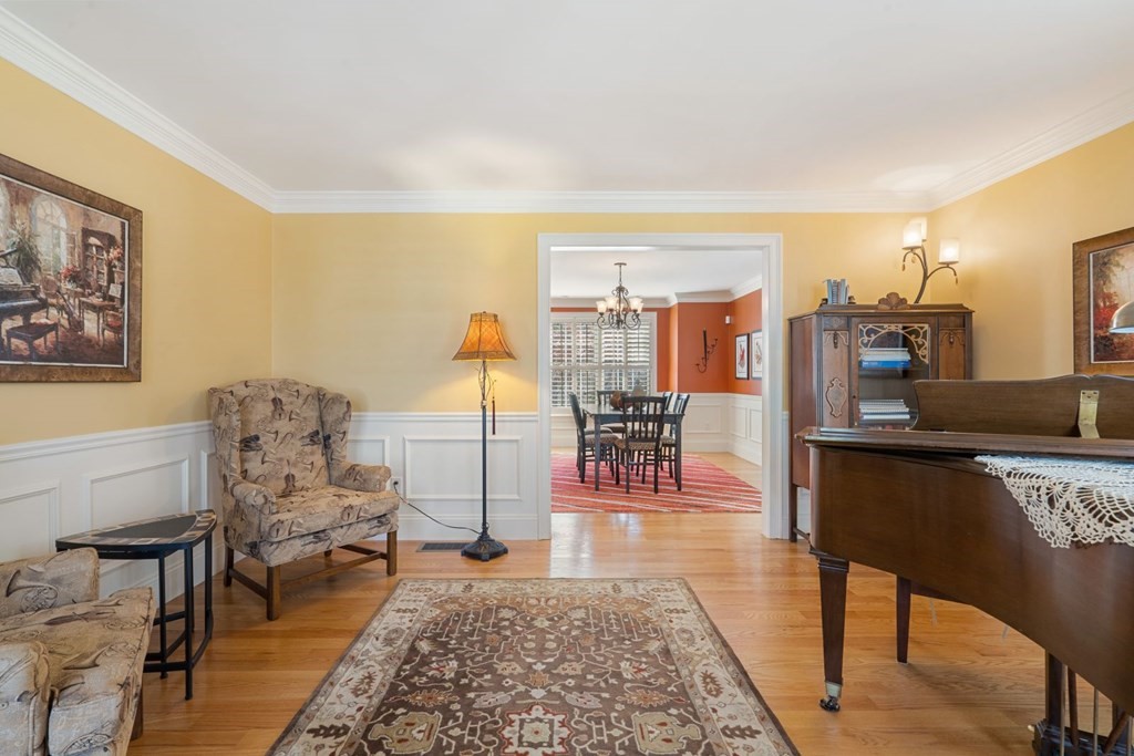 12 Alfreton Road Needham, MA 02494 - Photo 3 of 40 a living room with furniture and a rug