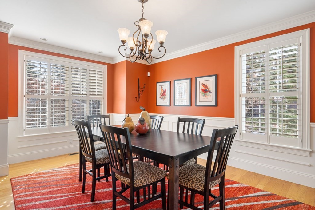 12 Alfreton Road Needham, MA 02494 - Photo 8 of 40 a view of a dining room with furniture window and wooden floor