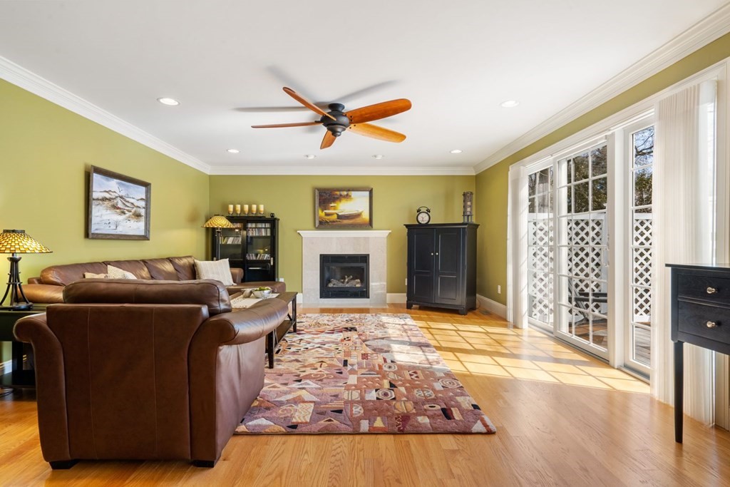 12 Alfreton Road Needham, MA 02494 - Photo 9 of 40 a living room with furniture and a fireplace