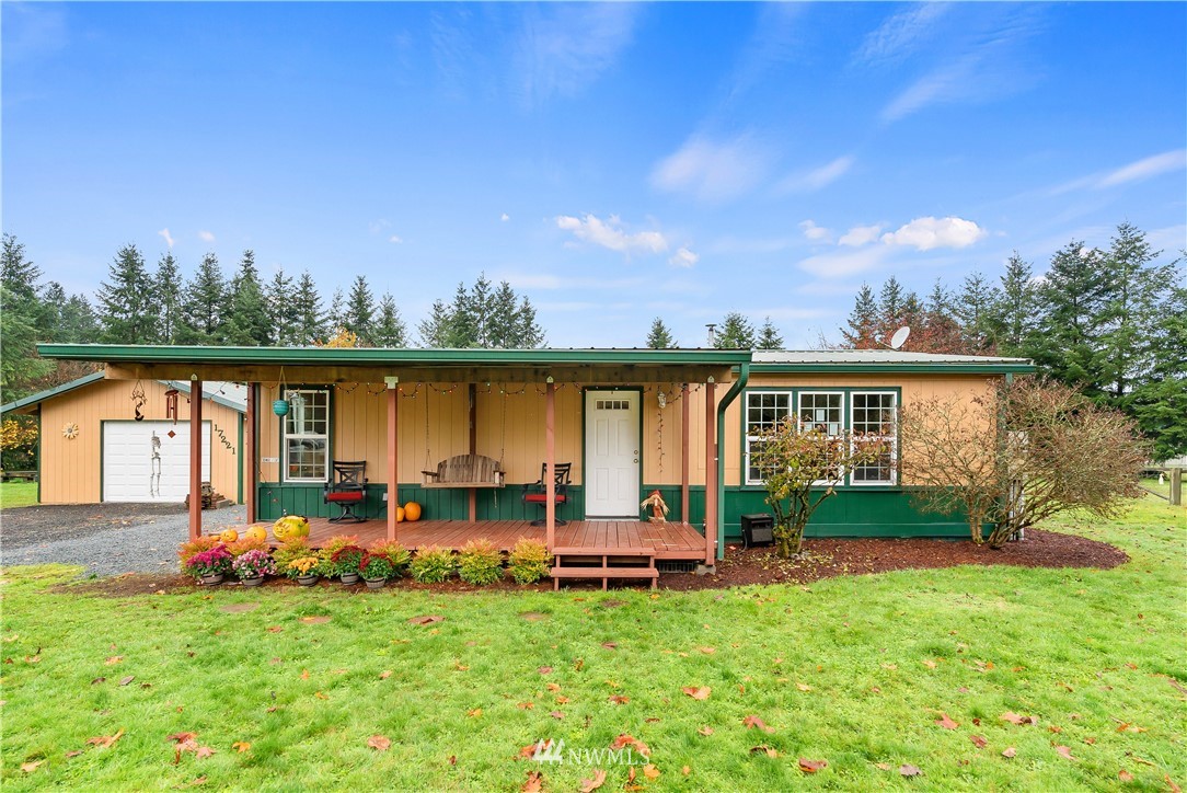 17221 Dodd Lane Southwest Rochester, WA 98579 - Photo 21 of 37 a front view of house with yard and lake view