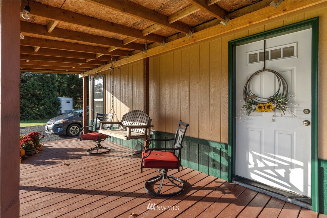 17221 Dodd Lane Southwest Rochester, WA 98579 - Photo 23 of 37 a sitting area with furniture and wooden floor