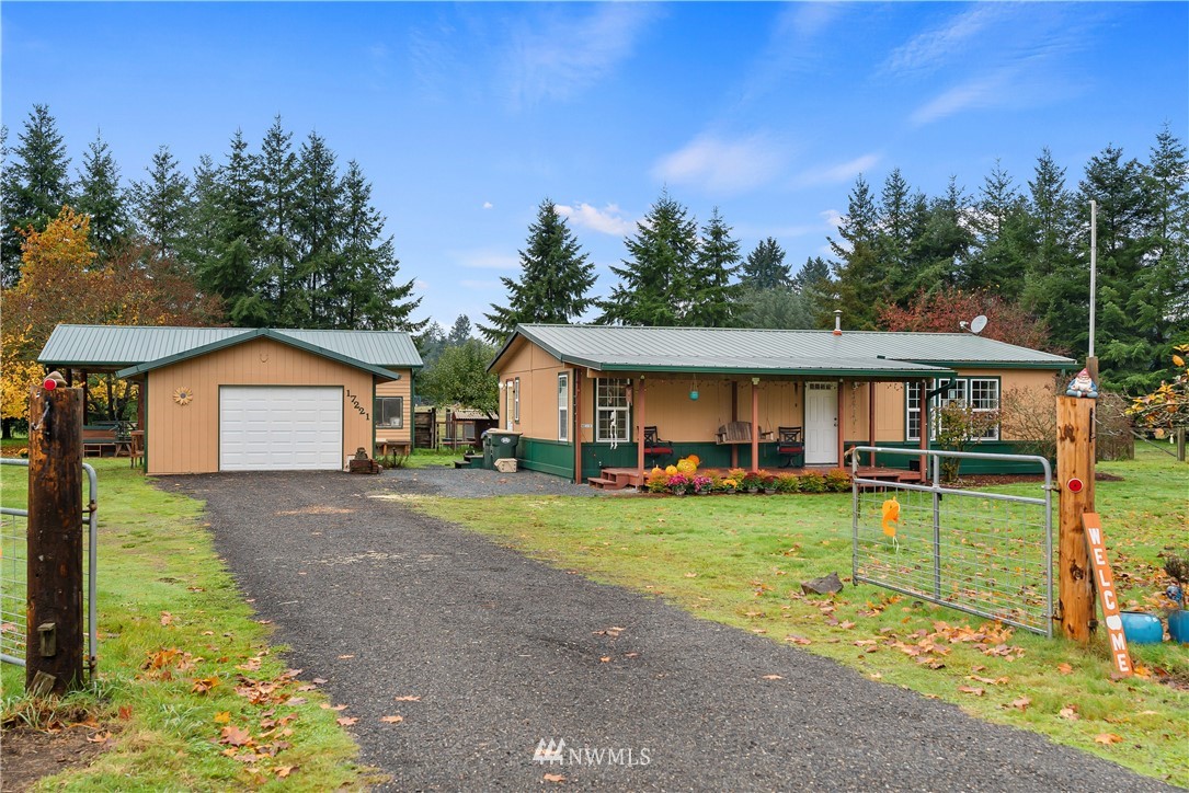 17221 Dodd Lane Southwest Rochester, WA 98579 - Photo 34 of 37 a front view of a house with garden