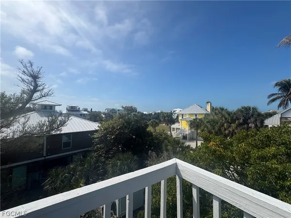 a balcony with an outdoor space