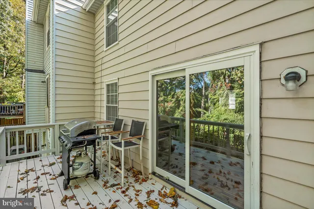 a table and chairs in a balcony