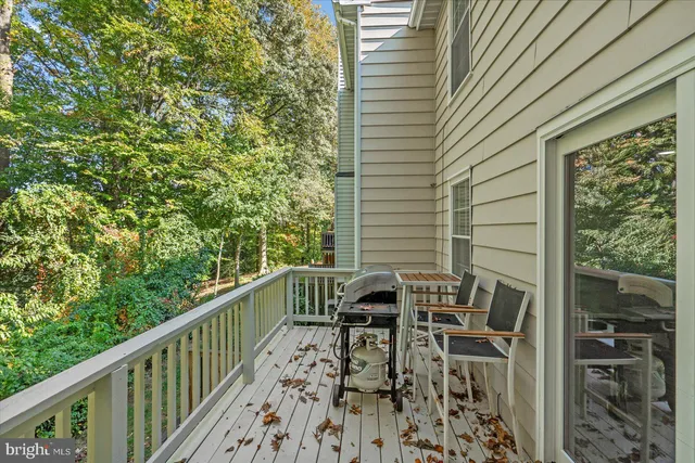 a view of balcony with furniture