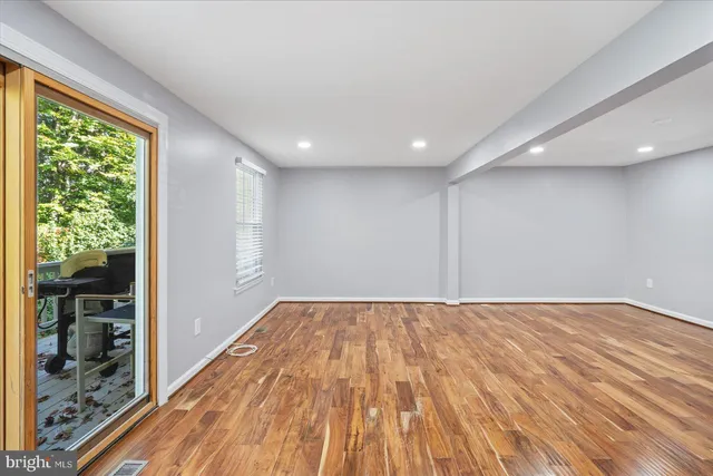 a view of an empty room and window
