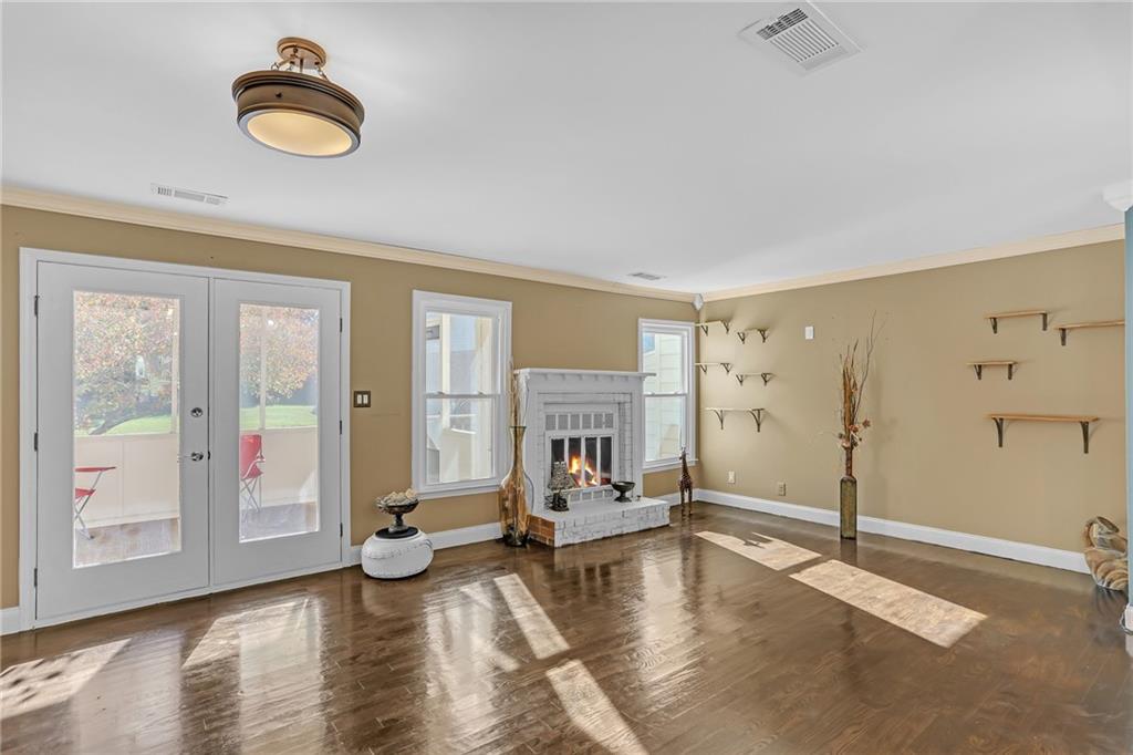 6315 Windsor Trace Drive Peachtree Corners, GA 30092 - Photo 15 of 26 a view of living room with furniture and floor to ceiling window