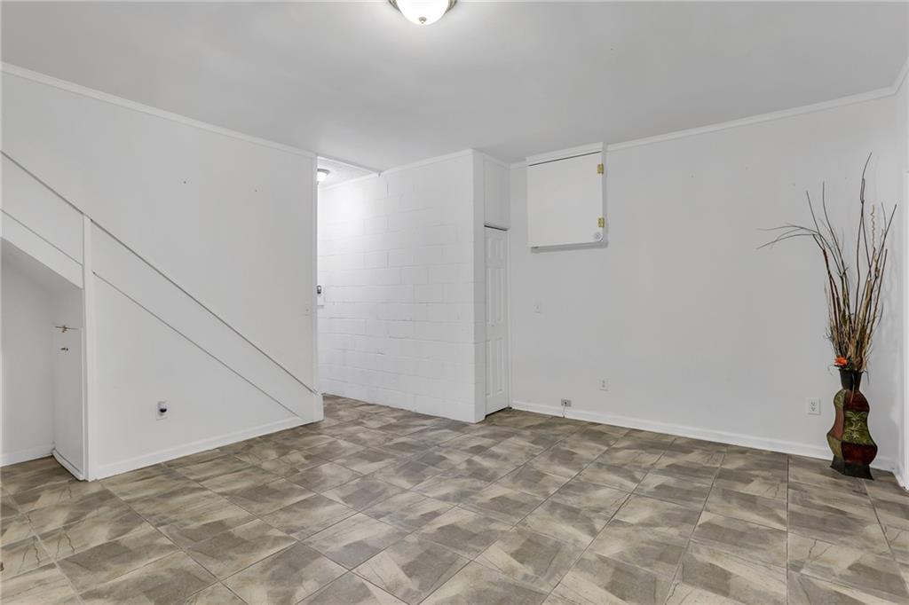 6315 Windsor Trace Drive Peachtree Corners, GA 30092 - Photo 21 of 26 a view of an empty room