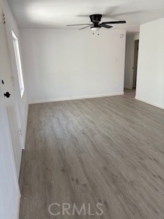 1680 South Tartar Lane, Unit 27 Compton, CA 90221 - Photo 11 of 12 a view of a room with wooden floor