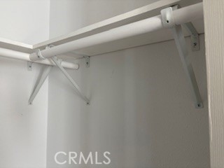 1680 South Tartar Lane, Unit 27 Compton, CA 90221 - Photo 4 of 12 a view of a rack on the wall