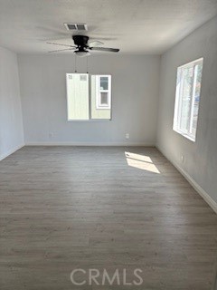 1680 South Tartar Lane, Unit 27 Compton, CA 90221 - Photo 9 of 12 a view of an empty room and window