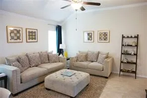 a living room with furniture and a couch