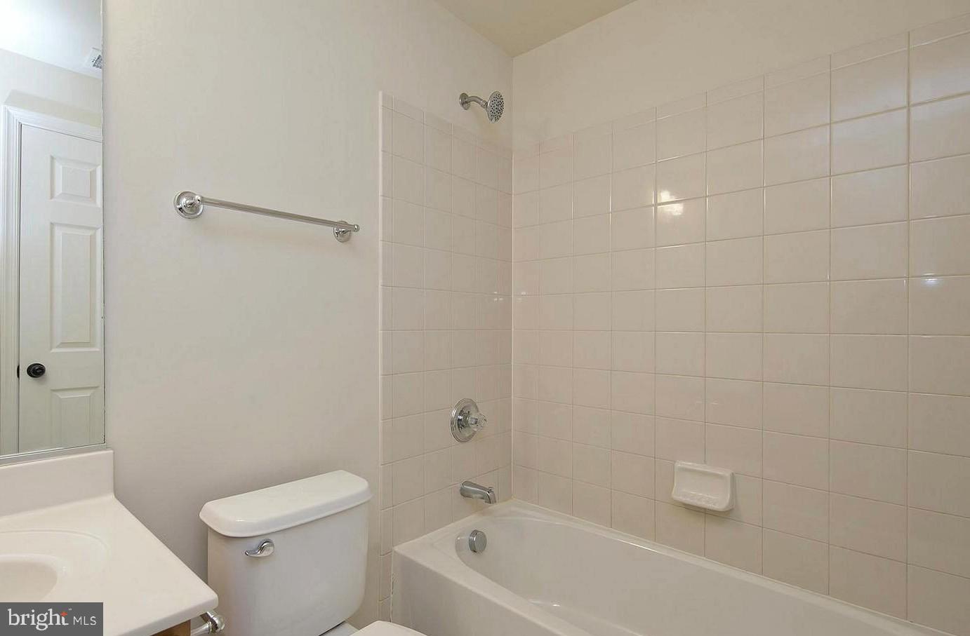 73 Spoon Square Front Royal, VA 22630 - Photo 19 of 28 a white toilet sitting next to a bath tub