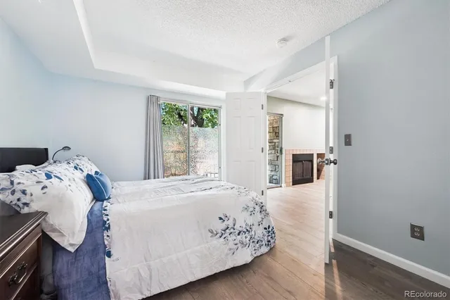 a bedroom with a bed and a table in it