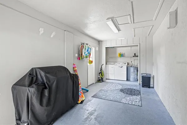 a utility room with cabinets