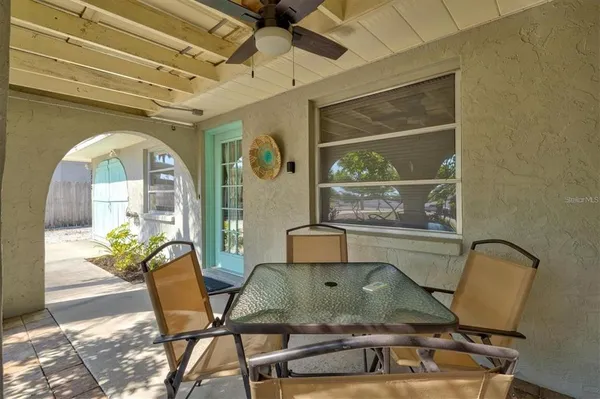 a room with furniture and wooden floor