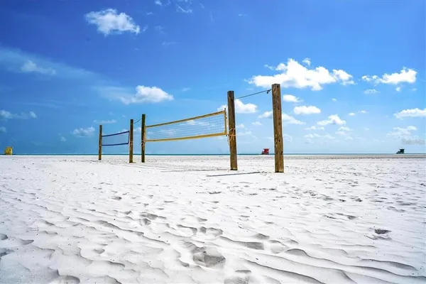 a view of a yard with snow on the road