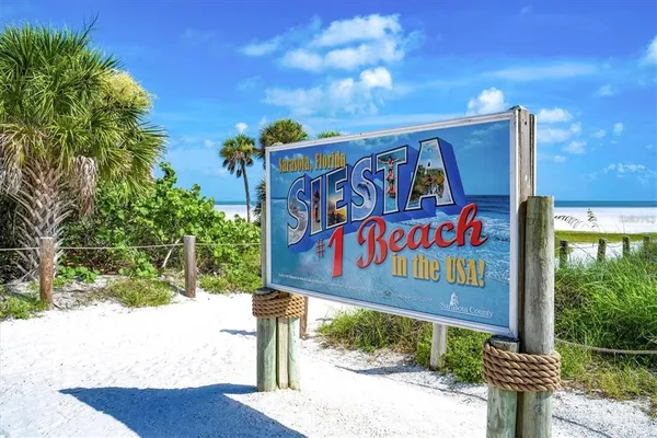 a sign on the side of the road