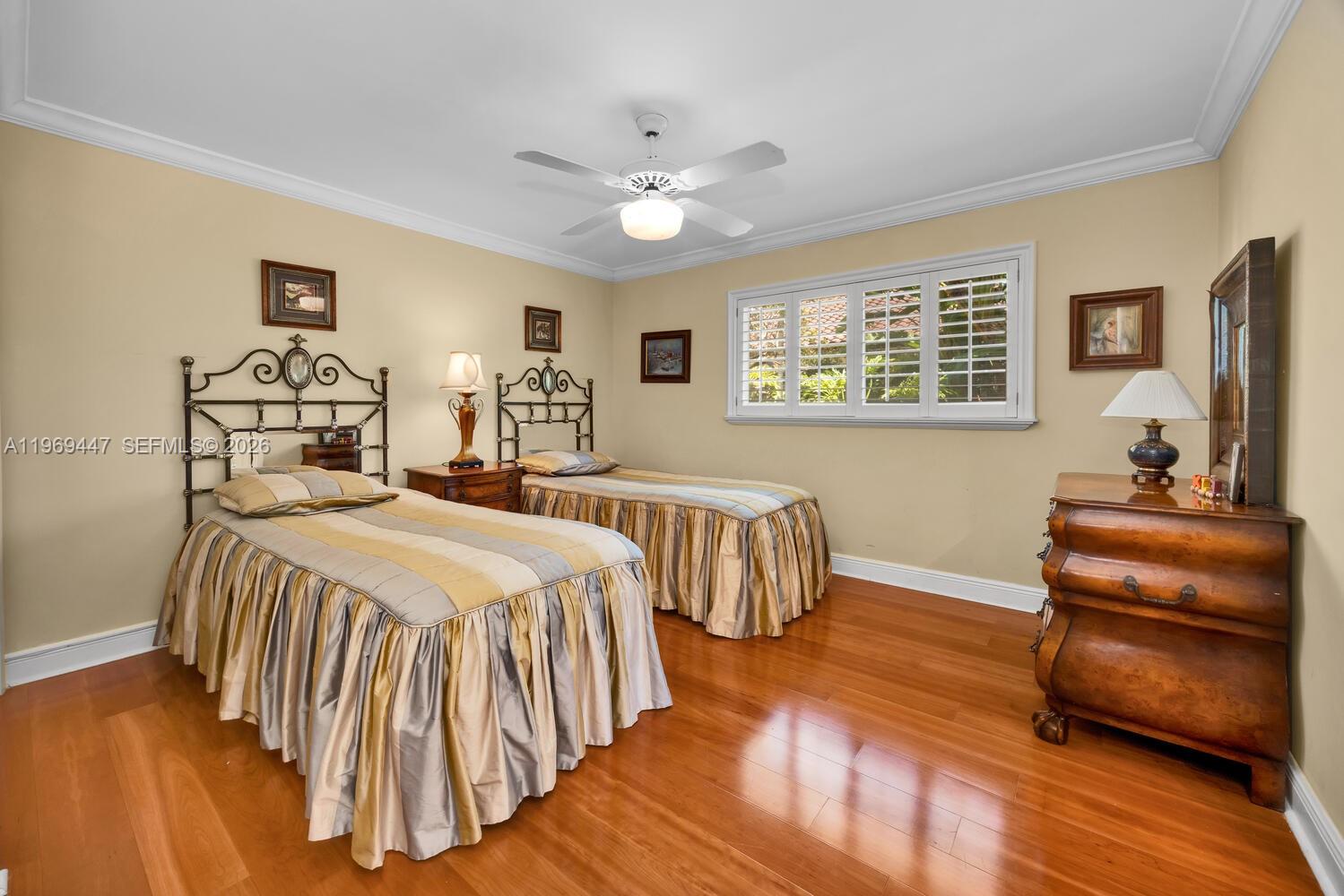 8840 Southwest 102nd Terrace Miami, FL 33176 - Photo 15 of 23 a bedroom with furniture and wooden floor