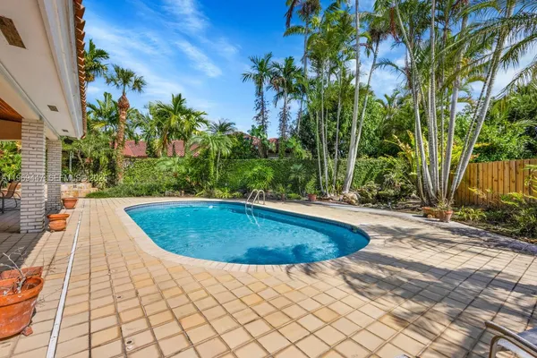 a view of outdoor space yard and swimming pool