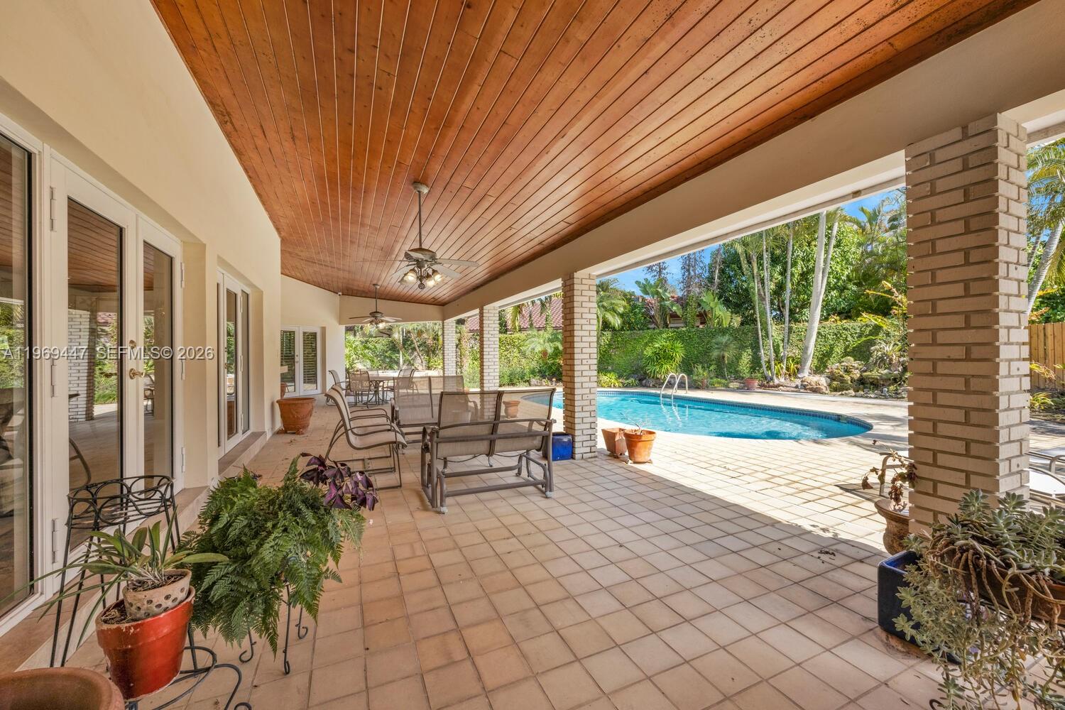 8840 Southwest 102nd Terrace Miami, FL 33176 - Photo 19 of 23 a building outdoor space with seating space