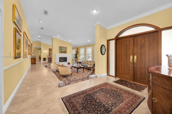 a living room with furniture and rug