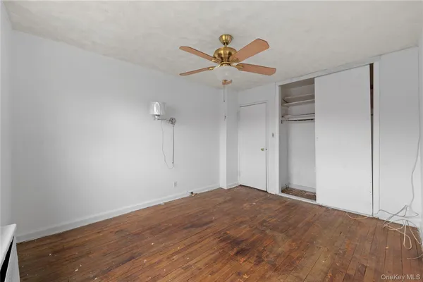 a view of a big room with wooden floor