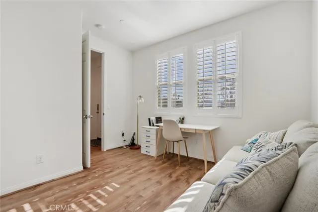 a view of a livingroom with furniture and window
