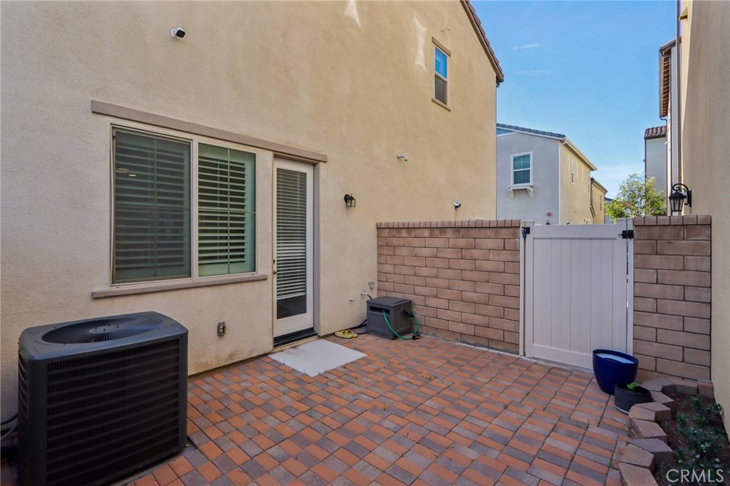 7656 Channel View Street Chino, CA 91708 - Photo 24 of 40 a front view of a house with a yard