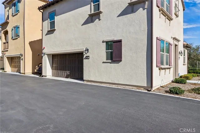 front view of a house with a street