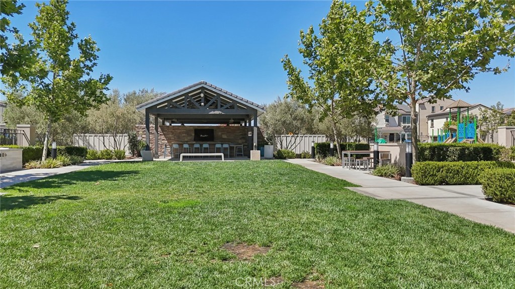 7656 Channel View Street Chino, CA 91708 - Photo 26 of 40 a front view of a house with a yard