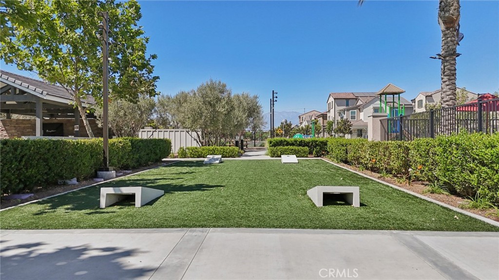 7656 Channel View Street Chino, CA 91708 - Photo 29 of 40 a view of a house with a yard