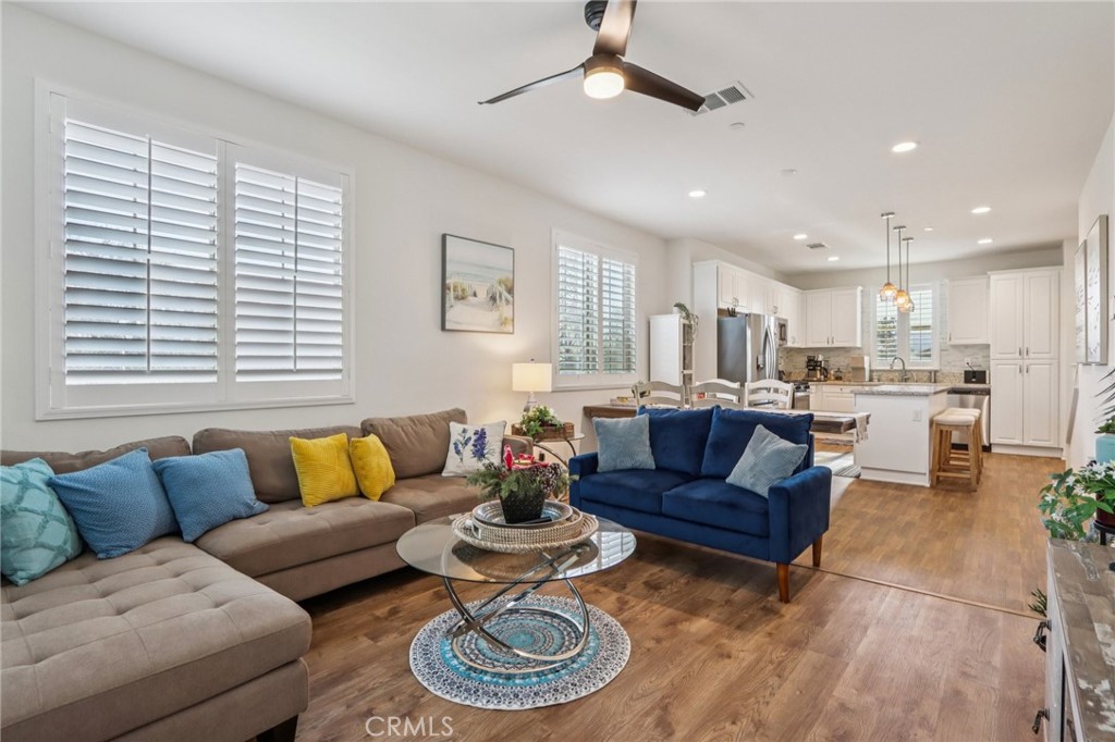 7656 Channel View Street Chino, CA 91708 - Photo 3 of 40 a living room with furniture and a large window