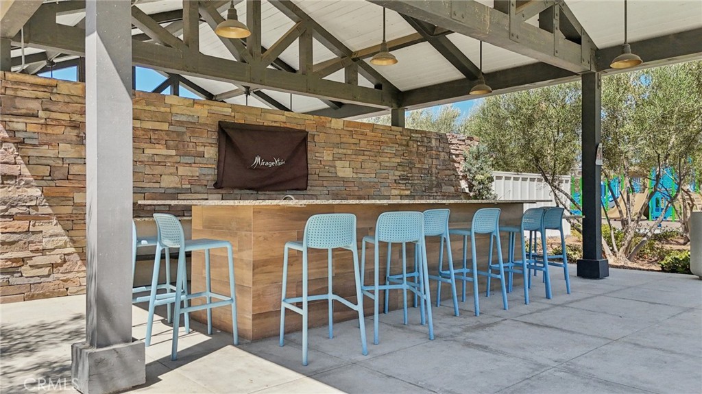 7656 Channel View Street Chino, CA 91708 - Photo 31 of 40 a view of a chairs and table in the patio