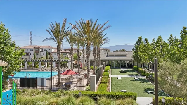 a view of a park with swings and slides