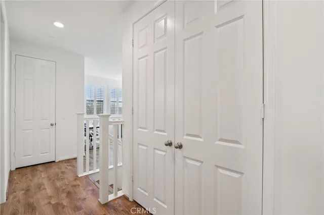 a view of a livingroom with wooden floor