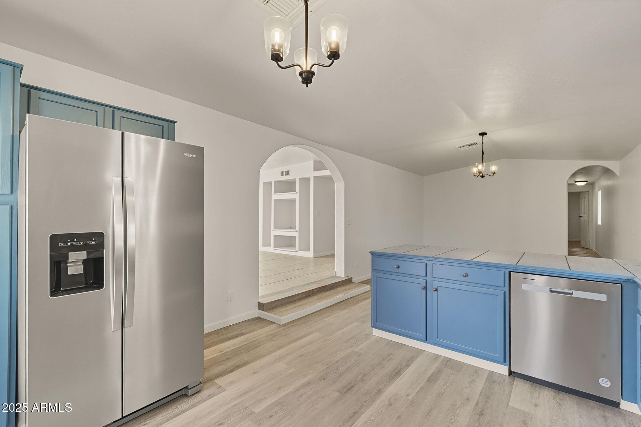 481 West Foothill Street Apache Junction, AZ 85120 - Photo 15 of 50 a view of a kitchen with a sink cabinet and a refrigerator