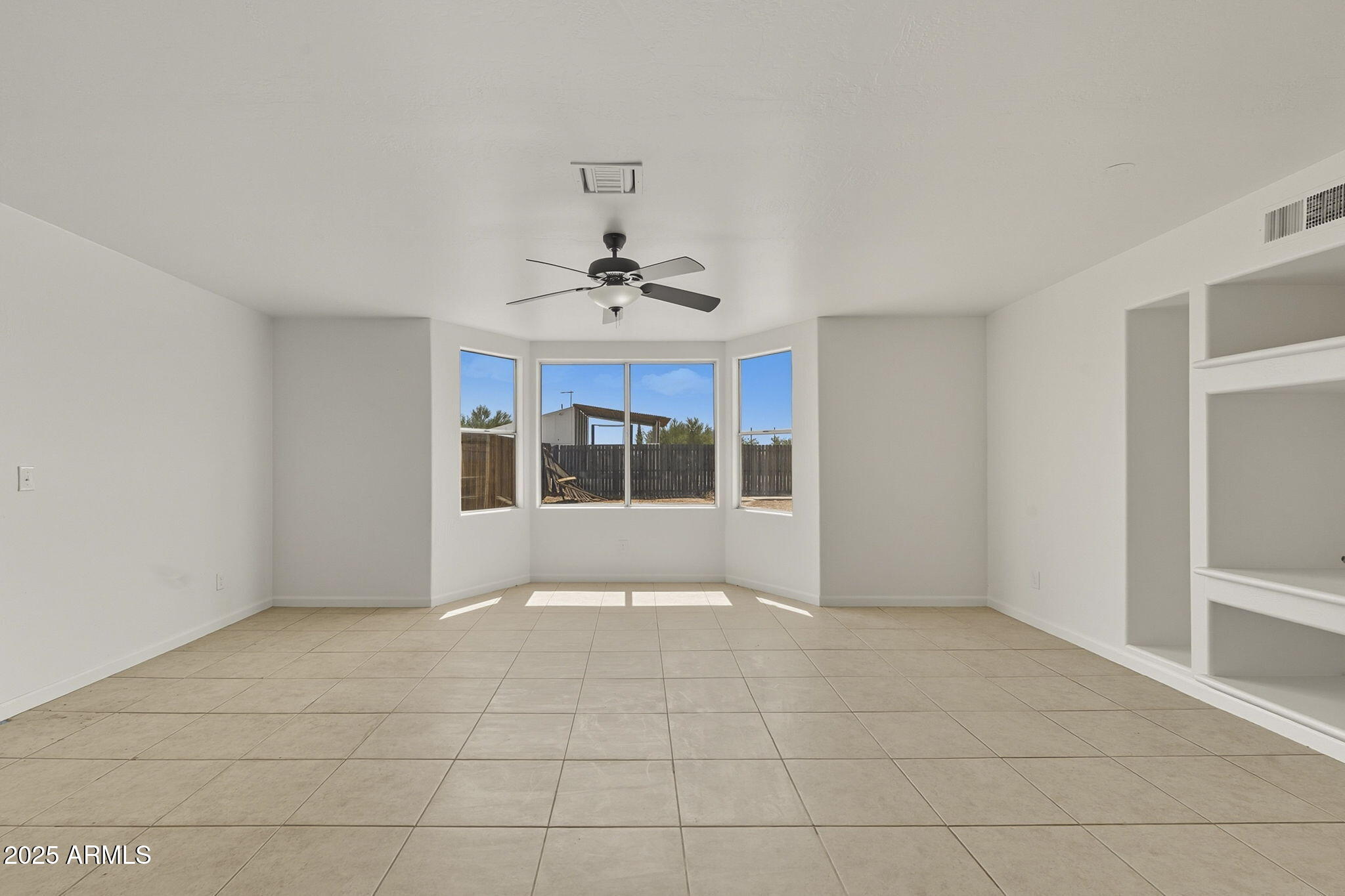481 West Foothill Street Apache Junction, AZ 85120 - Photo 17 of 50 a view of an empty room with a window