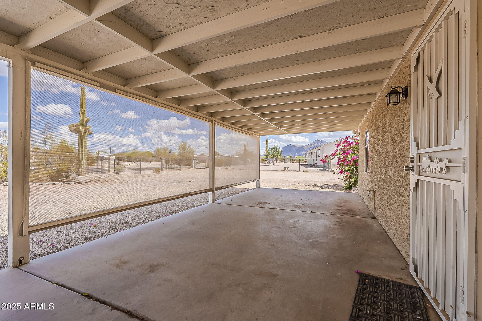 481 West Foothill Street Apache Junction, AZ 85120 - Photo 2 of 50 a view of a hallway with wooden floor