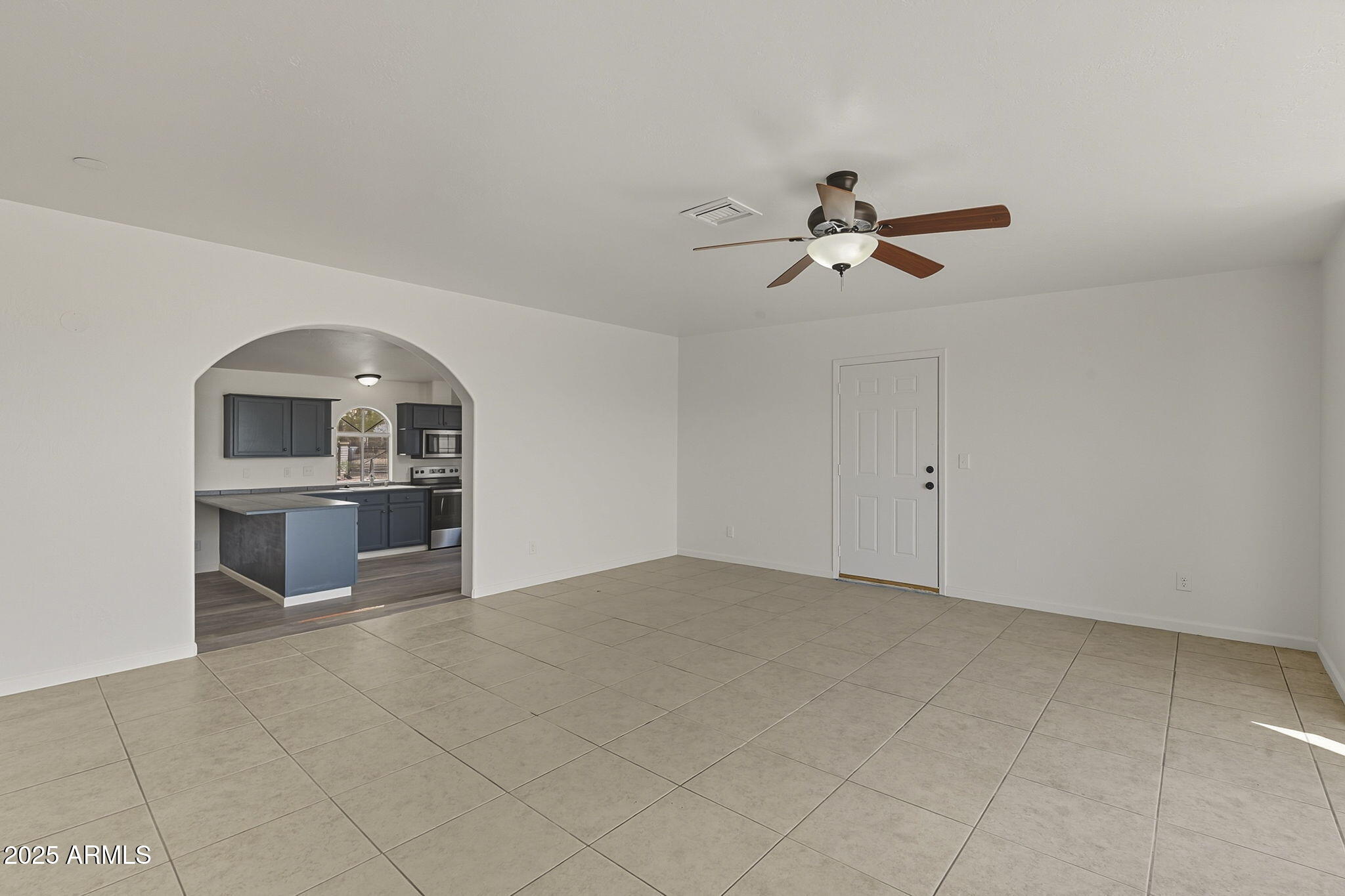 481 West Foothill Street Apache Junction, AZ 85120 - Photo 21 of 50 a view of a kitchen with a stove cabinets and a kitchen space